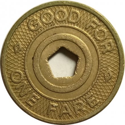 Транспортный жетон Good For One Fare. New York City Transit Authority