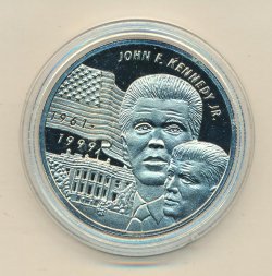 Либерия 5 долларов 1999 год - Джон Кеннеди (младший)