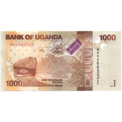 Уганда 1000 шиллингов 2013 год - Герб. Антилопы. Монумент независимости UNC-