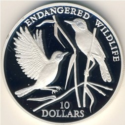 Монета Науру 10 долларов 1993 год - Исчезающие животные. Певчие птицы